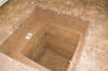 An excavation before sampling. Note the color changes between layers. The darker layers have carbon-rich deposits made by humans, such as midden or garbage that was scraped up and dumped to form the ridge structure during construction. There is little organic garbage in the upper third section. Credit: T.R. Kidder